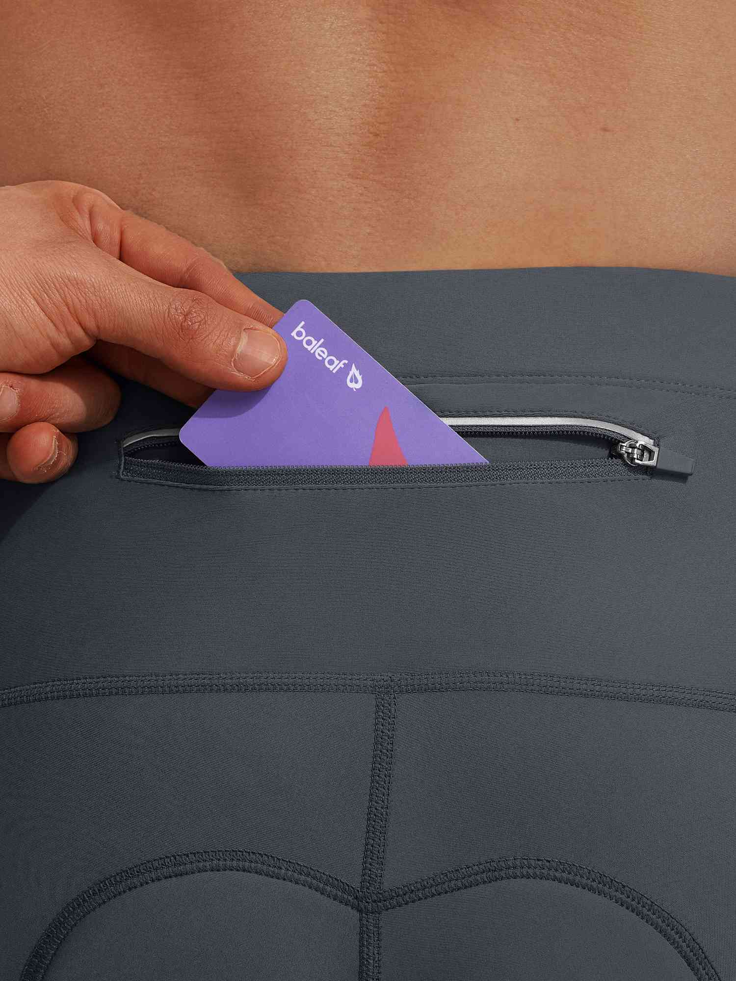 Baleaf 10" bike shorts with zippered back pocket shown with card insertion. #color_Dark Gray