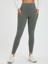 Grey 25" fleece-lined yoga leggings with side pockets and ultra-high waistband. #color_Dark Gray