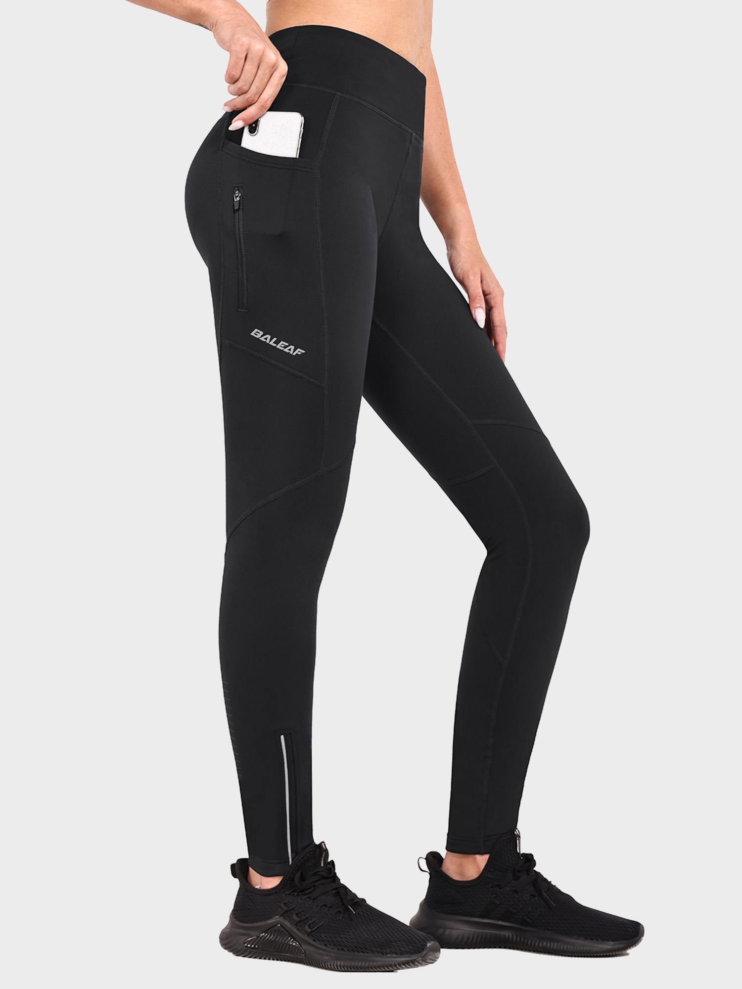 Black fleece-lined cycling leggings for women with side pockets and ankle zips. #color_Black