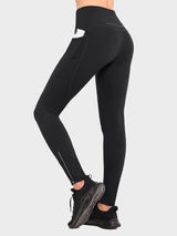 Women's black fleece-lined cycling leggings with side pocket and ankle zipper. #color_Black