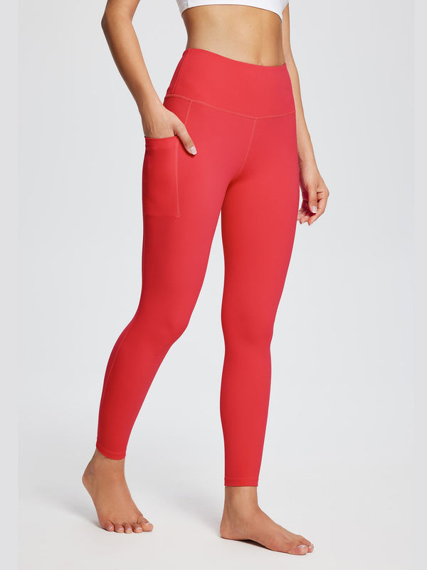 Baleaf Flyleaf Seamless Leggings in Red, hand in the side pocket