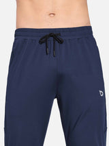 Navy blue men's fleece-lined water-resistant straight leg pants with drawstring waist and subtle logo #color_Navy Blue