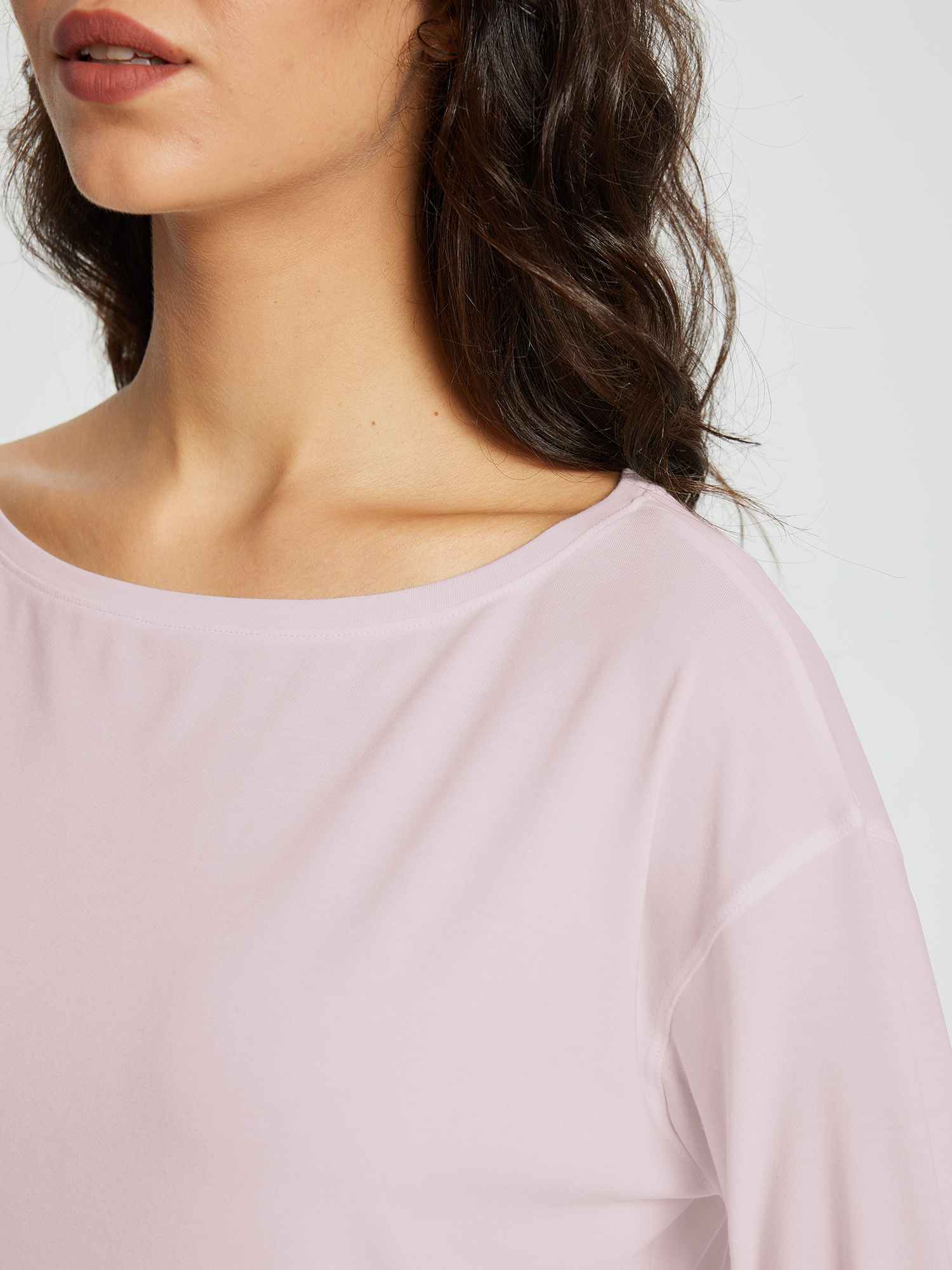 Light purple women's long-sleeve workout t-shirt with boat neck, showcasing soft fabric and loose fit. #color_Light Purple