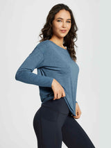 Blue women's long-sleeve workout t-shirt with boat neck, paired with dark leggings. Ideal for active wear. #color_Heather Blue
