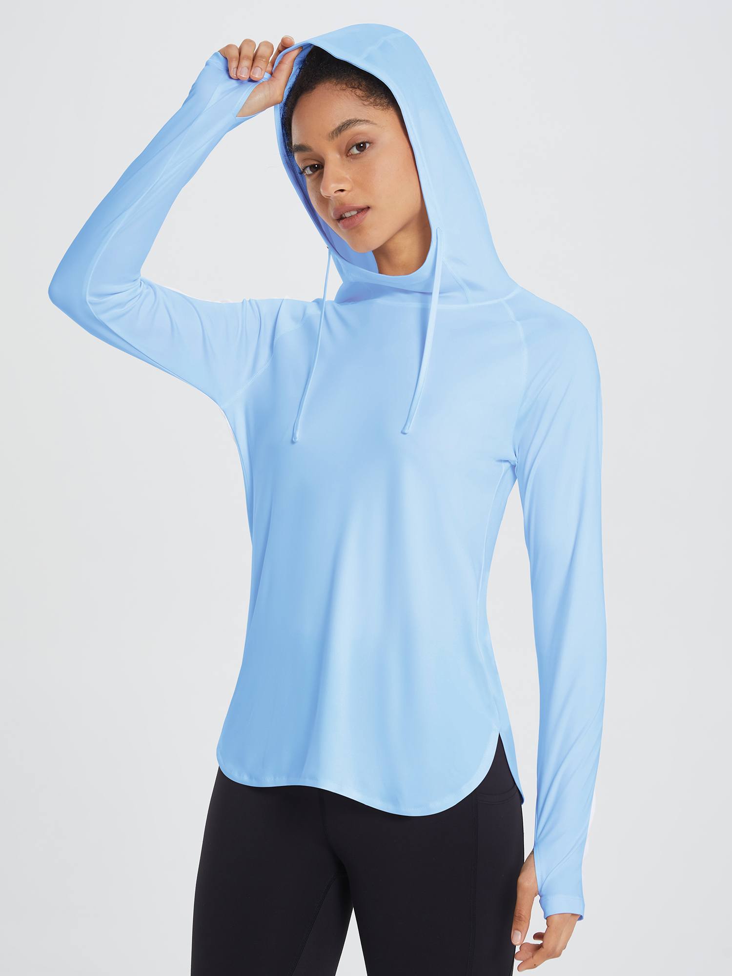 Light blue UPF 50+ sun hoodie shirt with thumbholes and drawstring hood for women. #color_Light Blue