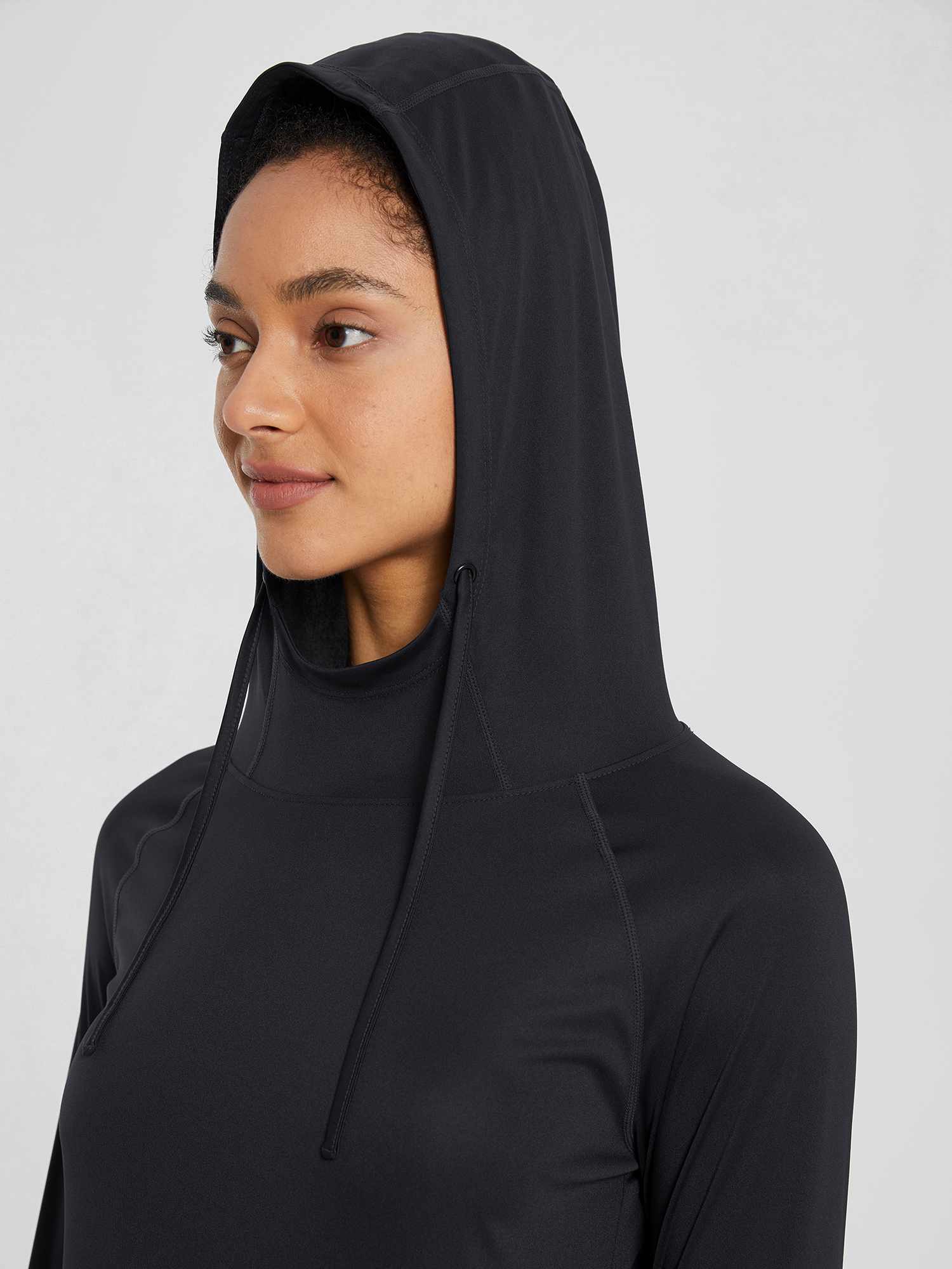 Black UPF 50+ sun hoodie shirt with adjustable drawstring hood. #color_Black
