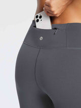 Dark gray running fleece leggings with a phone pocket and zipper detail. #color_Light Gray