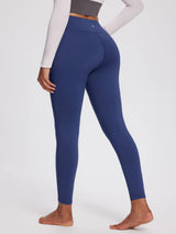 Women's navy blue petite fleece-lined yoga leggings with high waistband.