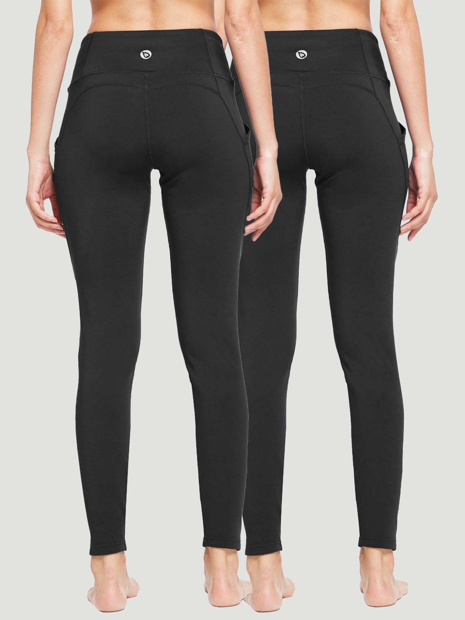 Black high-waist yoga leggings with side pockets, sold as a 2-pack. #color_Black