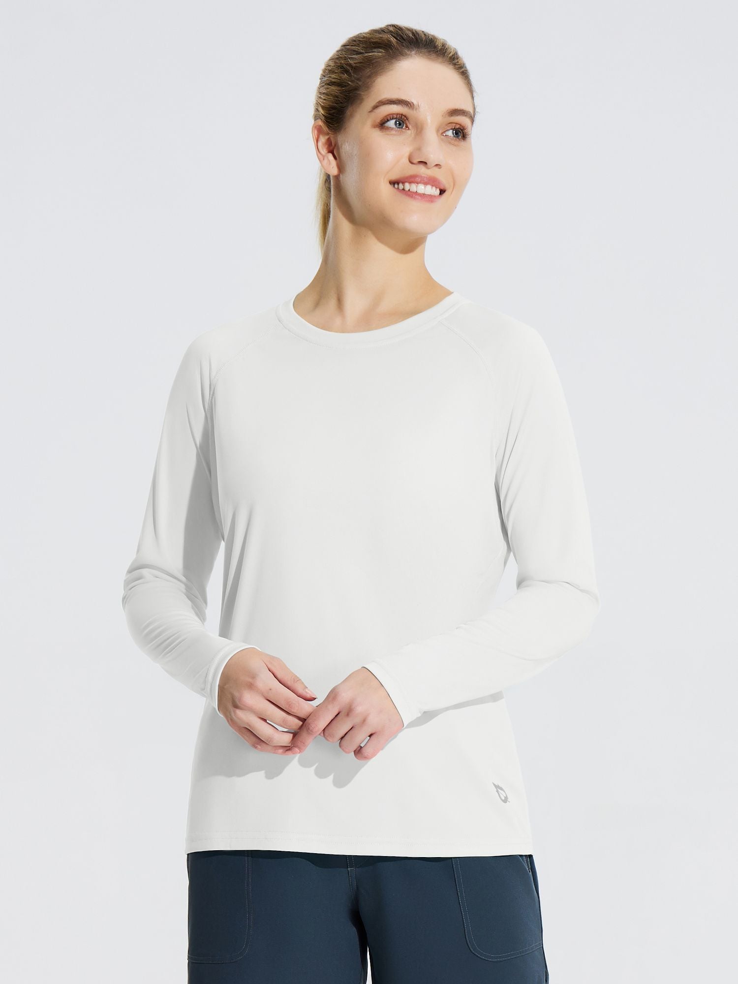 White long-sleeve rash guard with raglan sleeves and flatlock seams, perfect for women's outdoor activities. #color_White