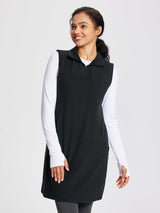 Black sleeveless fleece thermal dress, quarter-zip, thumbhole cuffs, worn over white long-sleeve shirt. #color_Black